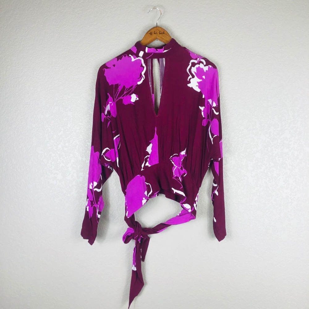 Beautiful open back, floral free people blouse
